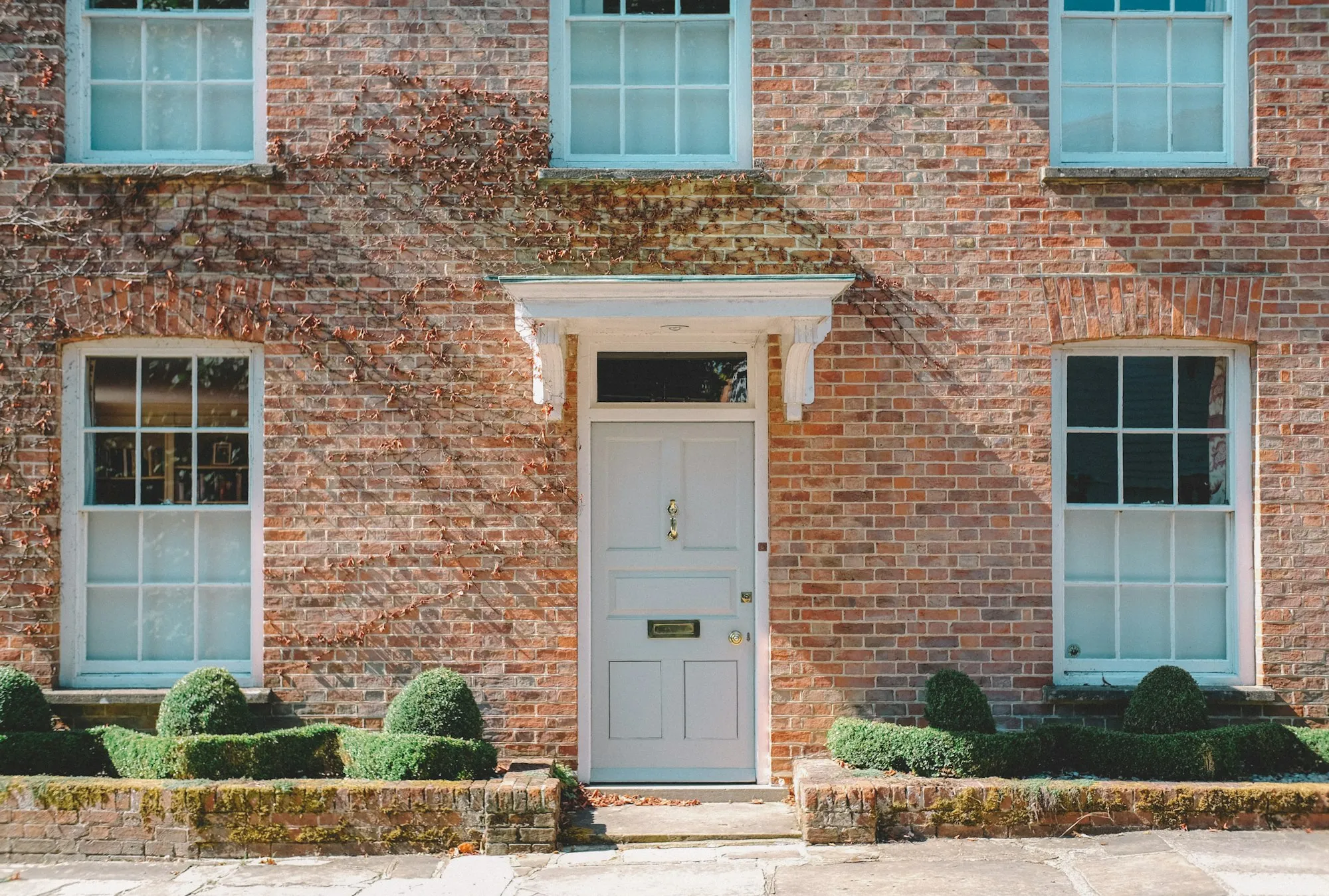 Front door of a brick family home